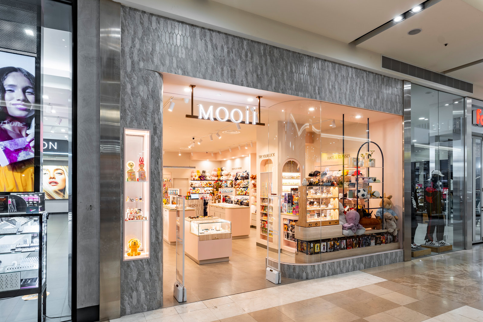 Boutique gift store shopfront with stone-clad portal